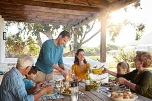 family celebrating Mother's Day on a patio
