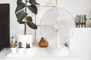 Fan on a table, leading us to wonder how long do portable outdoor fans last?