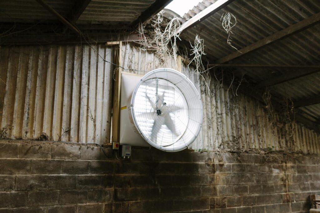 A large barn fan brings in air, many wonder what size fan do I need for my barn.