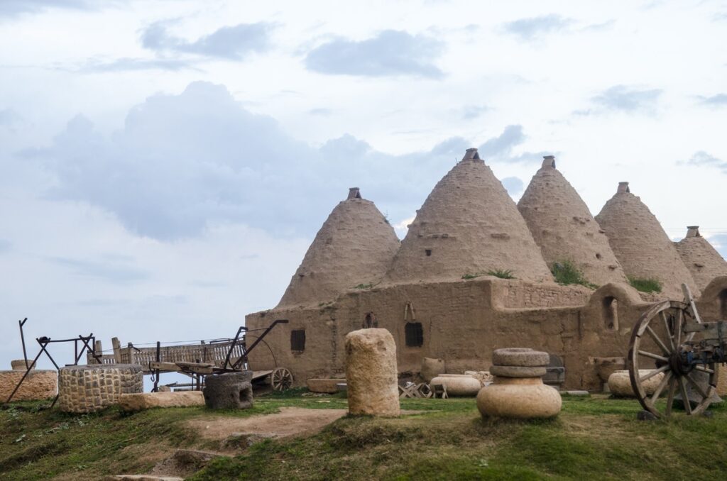 What is a swamp cooler image showing early evaporative cooling in ancient dwellings, the first swamp coolers