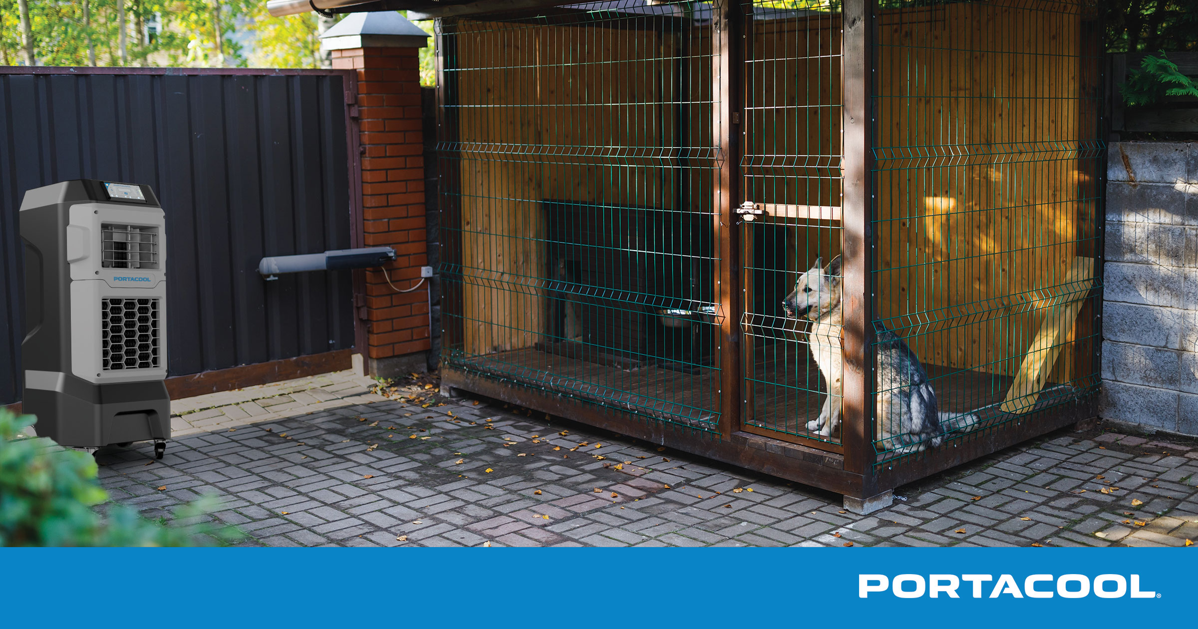 A dog being kept cool in a kennel by a Portacool evaporative cooler.