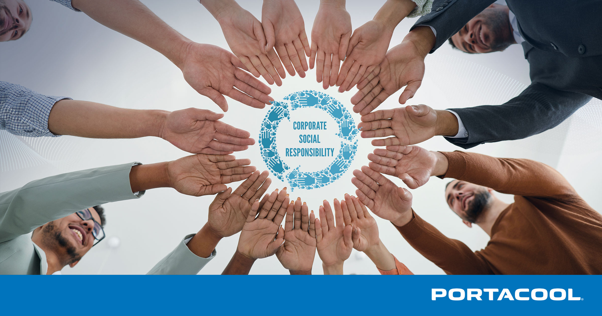 A group of people holding their hands together representing a community working together, around a graphic that says, "Corporate Social Responsibility."