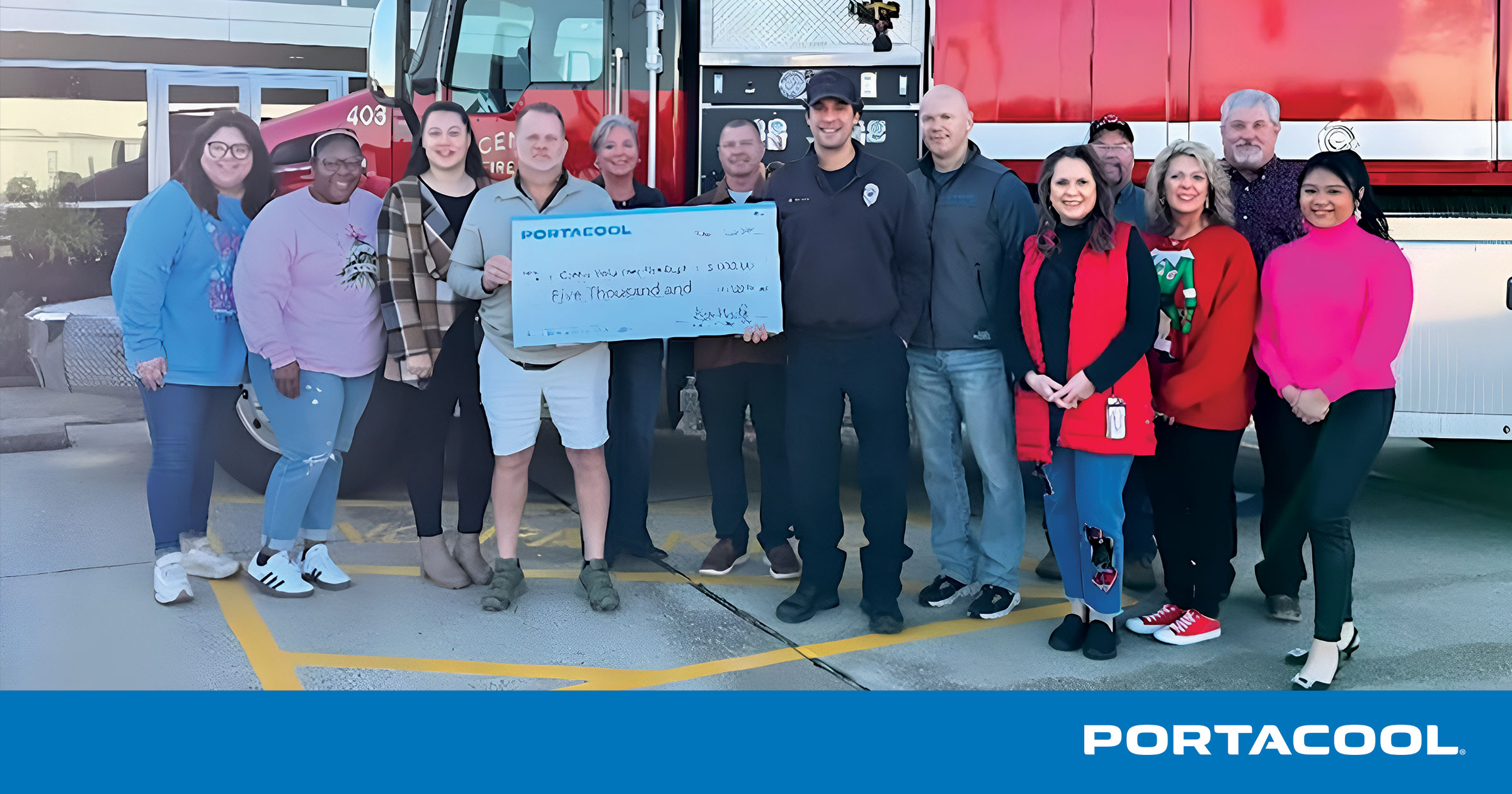 The Portacool CEO Ben Wulf and team donating money to support their local community.