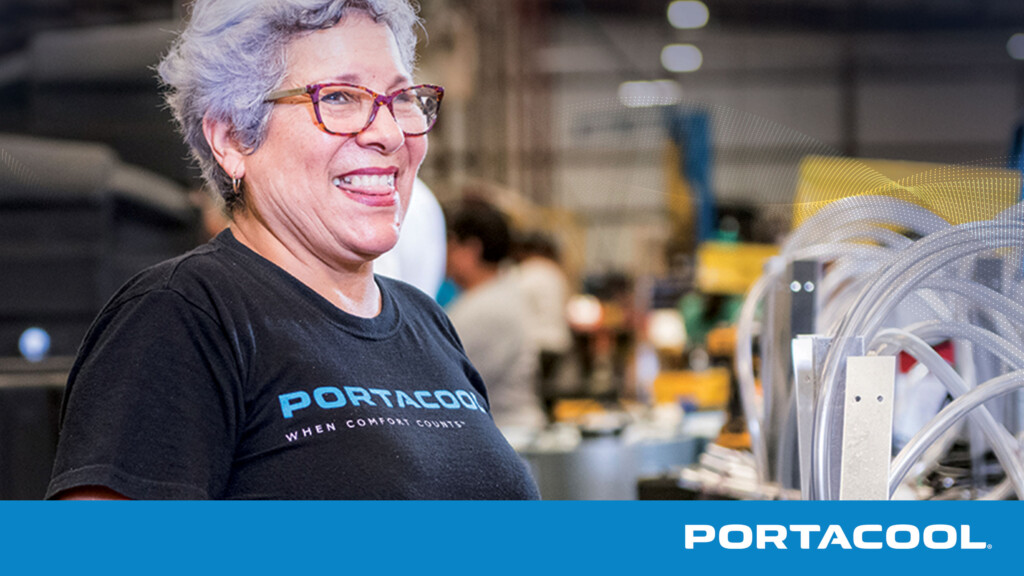 A Portacool employee smiles while at work.